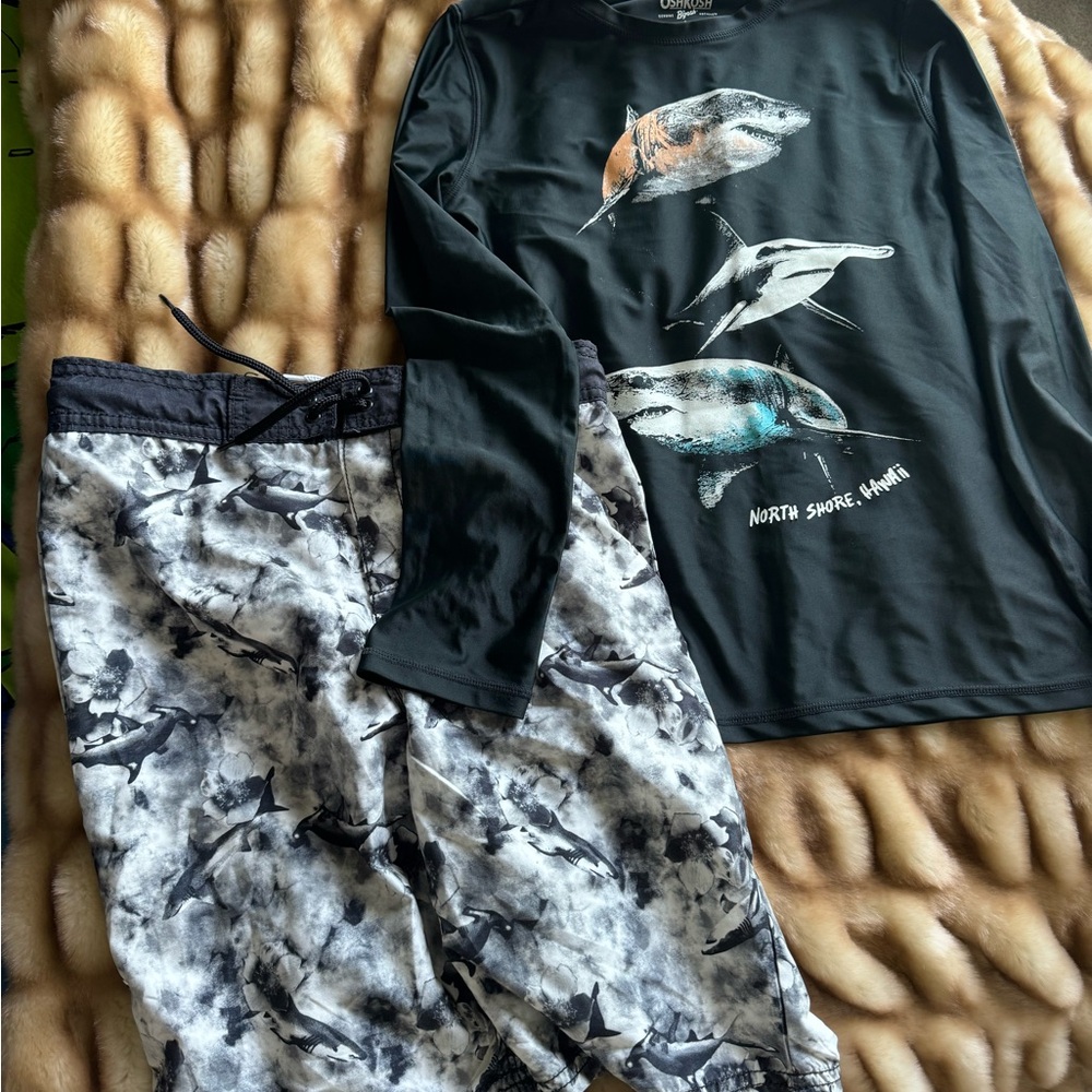 Boys OshKosh size 12 swim trunks and long sleeve rash guard.